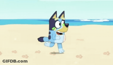 Cartoon Dog Holding Seashell On Beach GIF