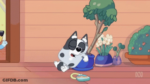 Cartoon Dog Laying Next To Potted Plant And Purse GIF
