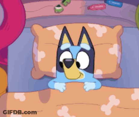 Cartoon Dog Lying In Bed GIF