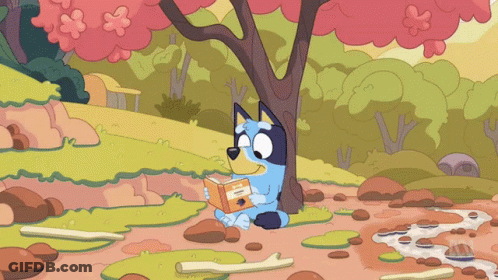 Cartoon Dog Reading Book By River GIF