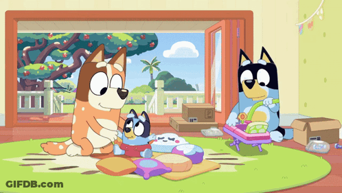 Cartoon Dogs Playing With Baby In Living Room GIF