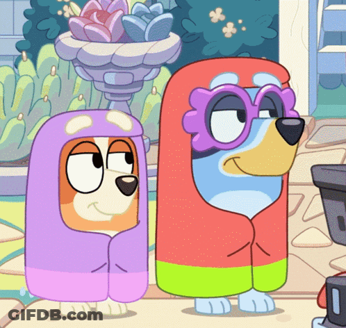 Cartoon Dogs Standing Together In Blankets GIF