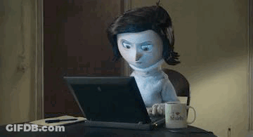 Cartoon Doll Typing On Laptop GIF