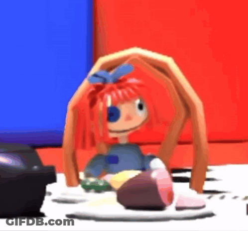 Cartoon Doll With Red Hair Sitting Next To Television GIF