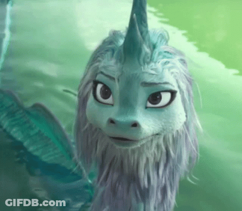Cartoon Dragon With Horn Looking At Camera GIF