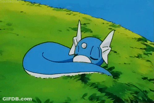 Cartoon Dragon With Wings Standing On Sidewalk GIF