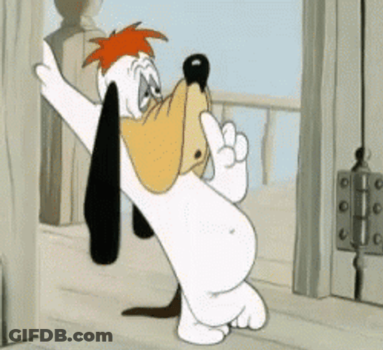 Cartoon Droopy The Dog Standing On Post GIF