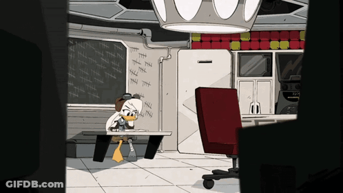 Cartoon Duck At Table With Chalkboard Numbers GIF