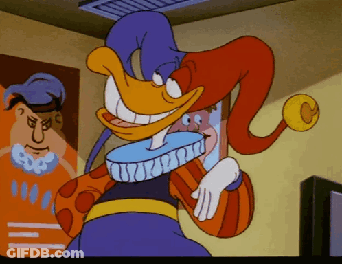 Cartoon Duck In Purple And Red Jester Hat GIF