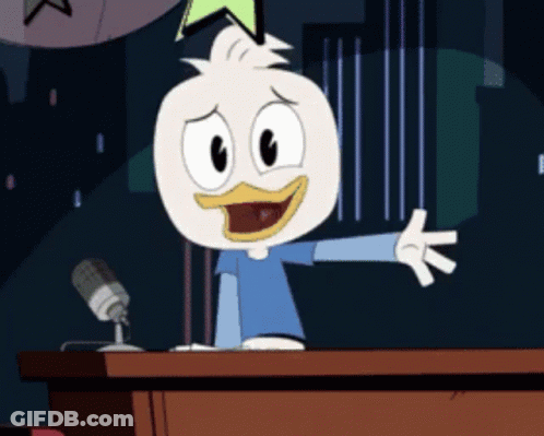 Cartoon Duck Standing At Podium With Microphone GIF