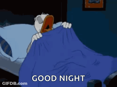Cartoon Duck Yawning In Bed GIF