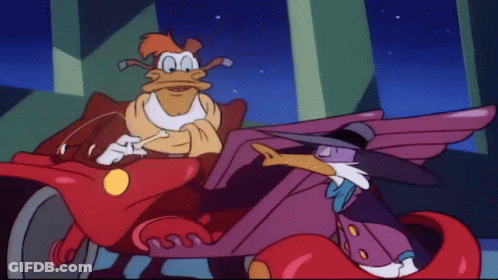 Cartoon Ducks Sitting In Red Car GIF
