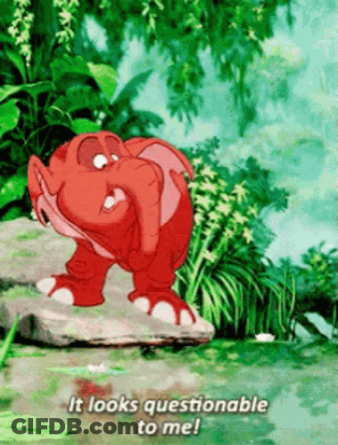 Cartoon Elephant On Rock Saying Looks Questionable GIF