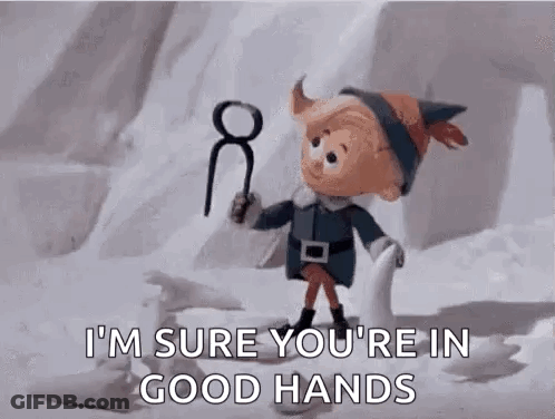 Cartoon Elf Holding Key Saying In Good Hands GIF