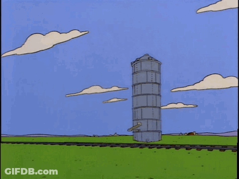 Cartoon Explosion With Flying Clock GIF