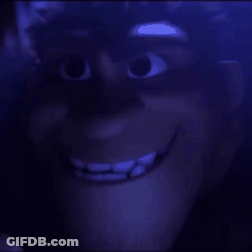 Cartoon Face Close Up In Dark Purple Room GIF