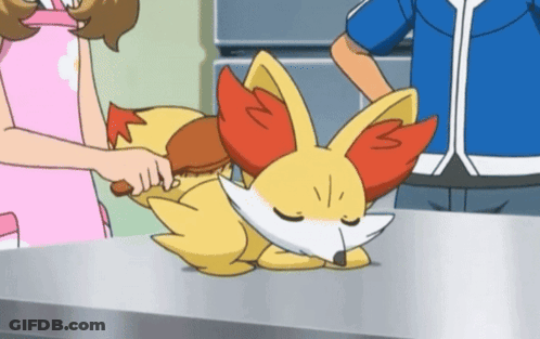 Cartoon Fox Laying On Table GIF