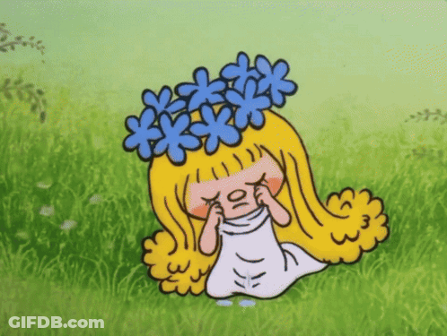 Cartoon Girl Crying With Blue Flower Wreath GIF
