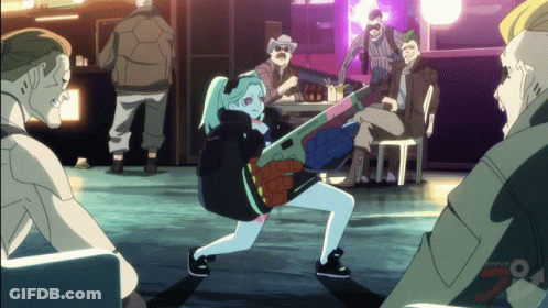 Cartoon Girl Holding Gun In Front Of Crowd GIF