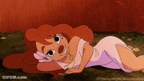 Cartoon Girl Laying On Ground With Flower On Head GIF