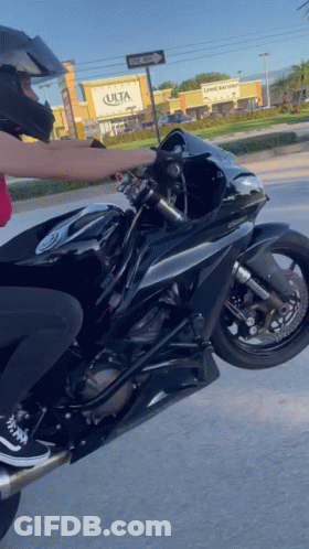 Cartoon Girl Riding Pink Motorcycle GIF