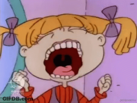 Cartoon Girl Screaming With Fist In Air GIF