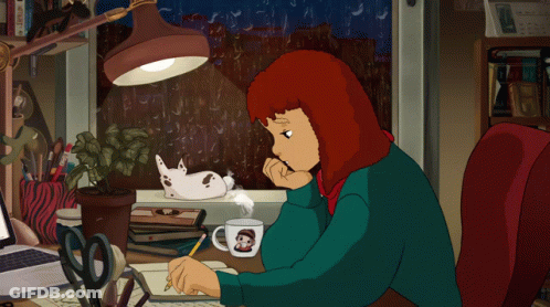 Cartoon Girl Sitting At Desk With Monkey Mug GIF