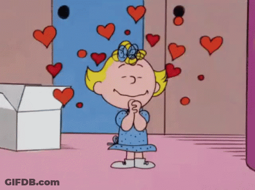 Cartoon Girl Surrounded By Hearts GIF