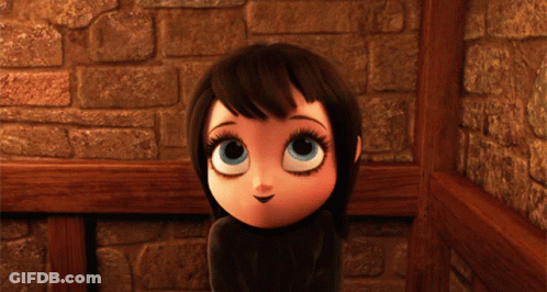 Cartoon Girl With Big Blue Eyes Standing Before Stone Wall GIF