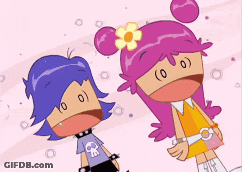 Cartoon Girl With Flower Beside Girl In Skull Shirt GIF