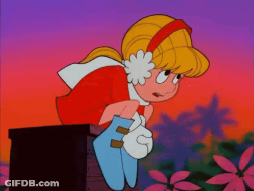 Cartoon Girl With Flower In Ear Sitting On Box GIF