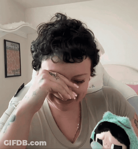 Cartoon Girl With Flower In Hair Eyes Closed GIF