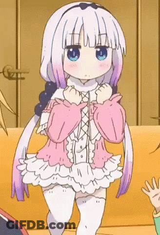 Cartoon Girl With Purple Hair And Blue Eyes In Front Of Yellow Couch GIF