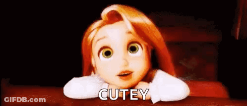 Cartoon Girl With Red Hair And Green Eyes Laying In Bed GIF