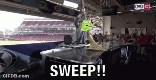 Cartoon Green Monster Sweeping Table In Front Of Crowd GIF