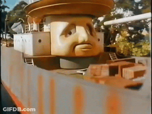 Cartoon Head On Top Of Building GIF