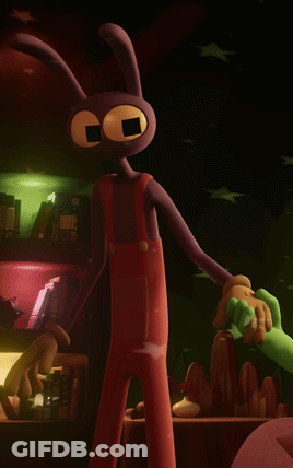 Cartoon In Red Overalls Holding Green Stuffed Animal GIF