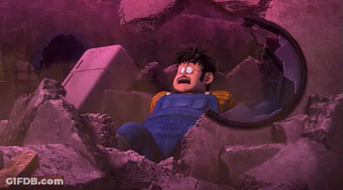 Cartoon Laying In Pile Of Rocks With Fridge GIF