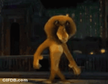 Cartoon Lion Walking Down Street GIF