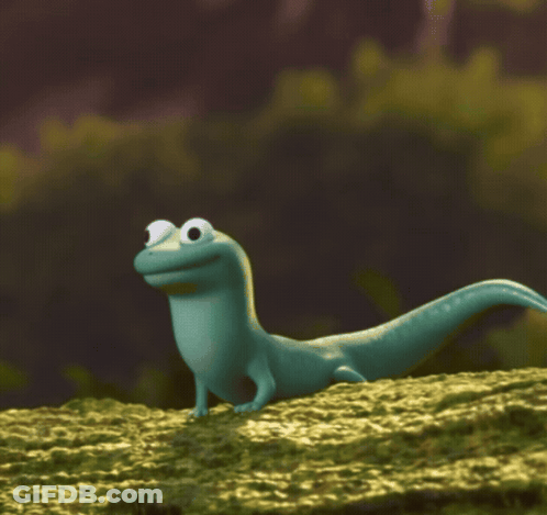 Cartoon Lizard Smiling On Rock GIF