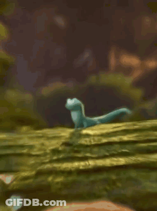 Cartoon Lizard Standing On Mossy Hill GIF