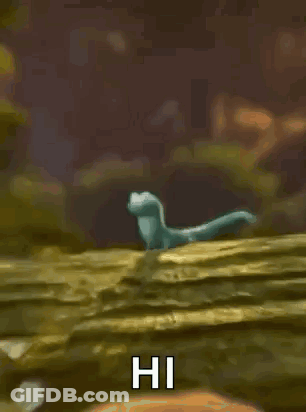 Cartoon Lizard Standing On Rock Waving GIF