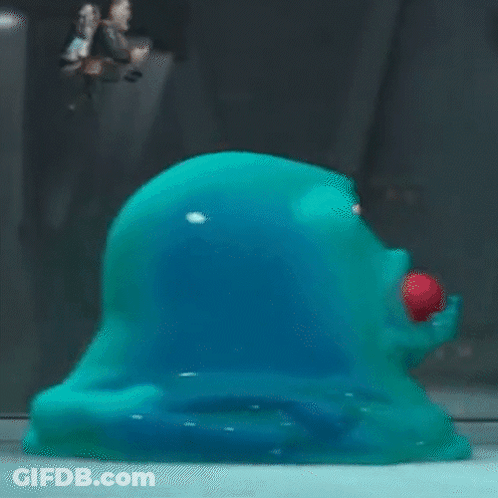 Cartoon Looking At Blue Blob With Red Eyes GIF