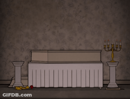 Cartoon Man Kneeling At Coffin And Candles GIF