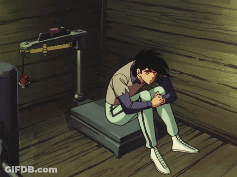 Cartoon Man Sitting On Scale Head On Knees GIF