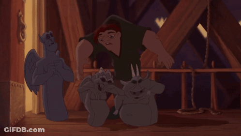 Cartoon Man Standing Next To Gargoyle Statue GIF