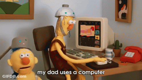 Cartoon Man Using Computer Saying My Dad Uses A Computer GIF