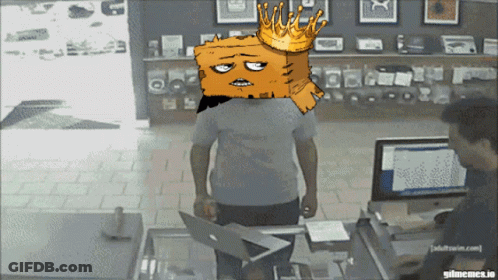 Cartoon Man Wearing Crown Standing In Front Of Computer GIF