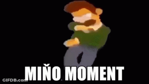 Cartoon Man With Beard Dancing In Dark Room Saying Mino Moment GIF