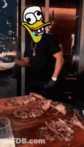 Cartoon Man With Duck On Face In Front Of Cutting Board Of Meat GIF